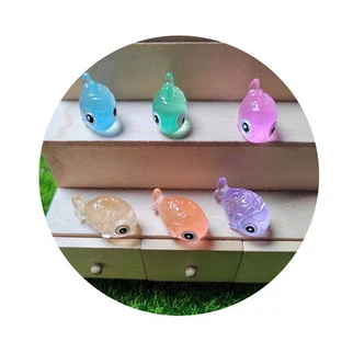 Perles en plastique qui brillent dans le noir